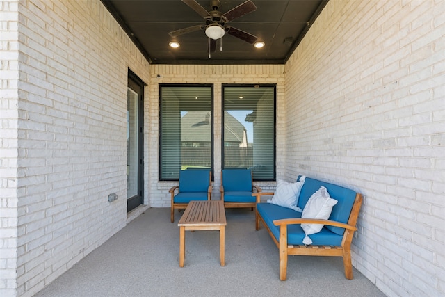 view of patio with outdoor lounge area and ceiling fan