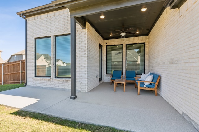 view of patio / terrace with ceiling fan and an outdoor hangout area