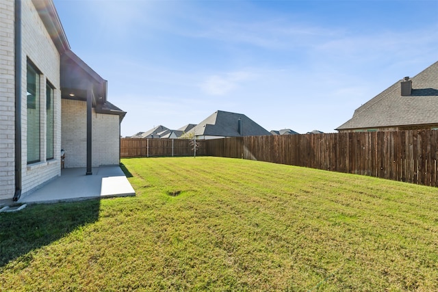 view of yard with a patio area