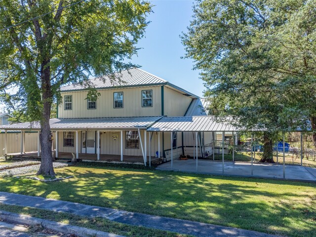 view of front of home with a porch and a front lawn