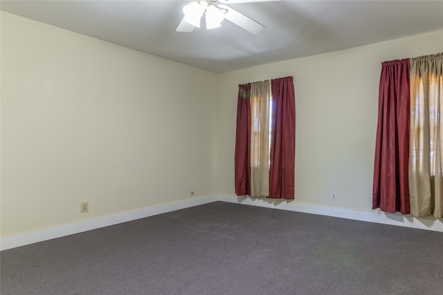 unfurnished room with carpet flooring and ceiling fan