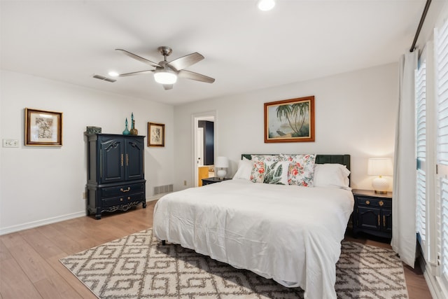 bedroom featuring light hardwood / wood-style floors and ceiling fan