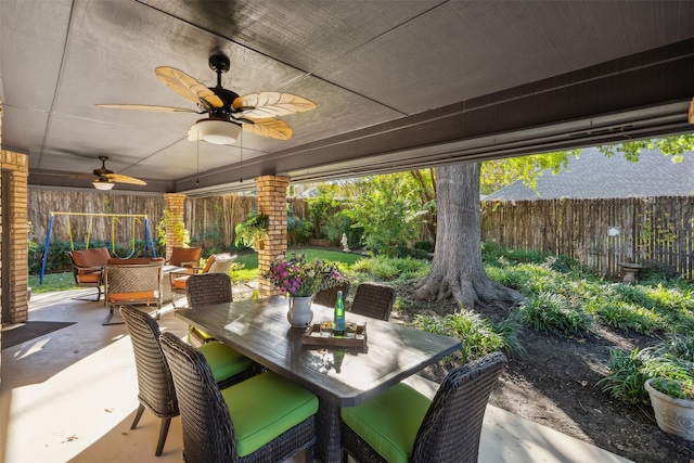 view of patio featuring ceiling fan