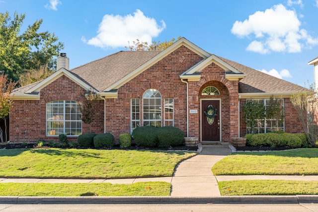 view of front property with a front yard