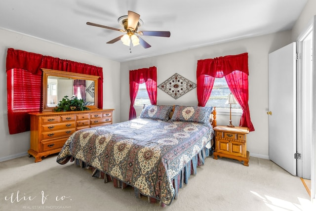 carpeted bedroom featuring ceiling fan