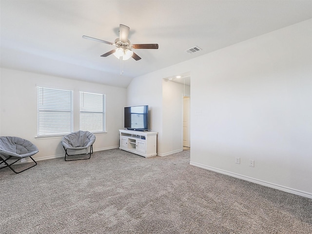 unfurnished room featuring light carpet, ceiling fan, and lofted ceiling