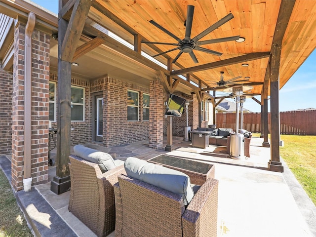 view of patio featuring outdoor lounge area and ceiling fan