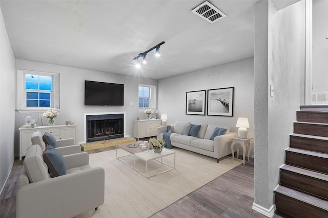 living room with hardwood / wood-style floors