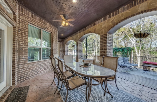 view of patio / terrace featuring ceiling fan