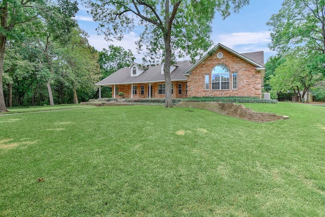 view of front of property with a front lawn