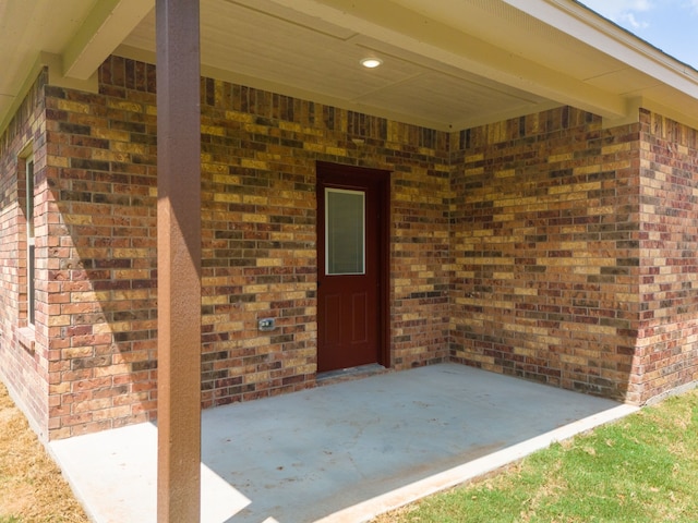 doorway to property featuring a patio