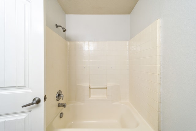 bathroom with shower / tub combination