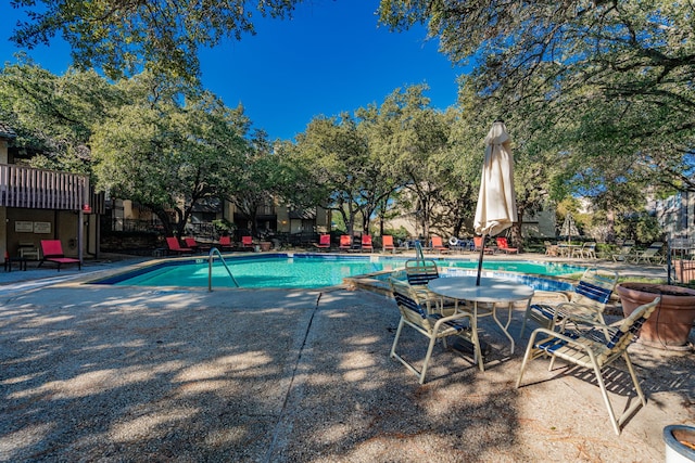 view of pool featuring a patio