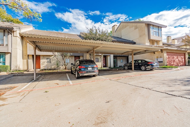 view of parking with a carport