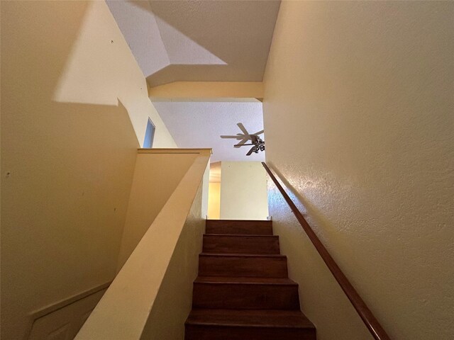 staircase with ceiling fan