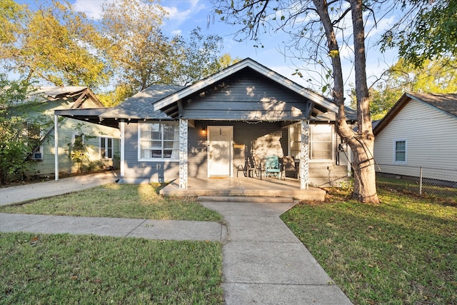 bungalow with a front yard