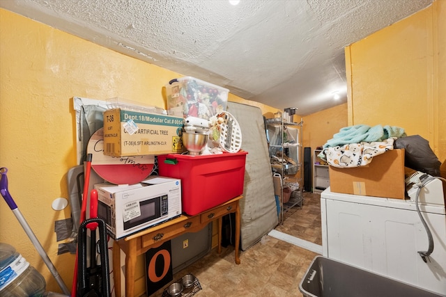 storage room with washing machine and clothes dryer