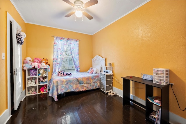 bedroom with hardwood / wood-style flooring, ceiling fan, and ornamental molding