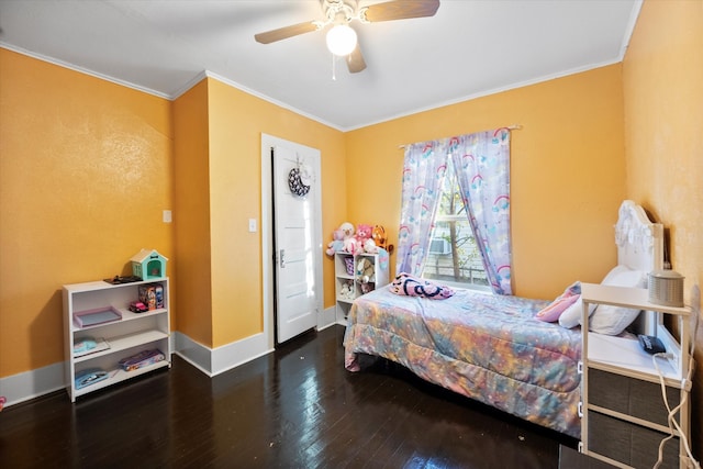 bedroom featuring ceiling fan, dark hardwood / wood-style floors, and ornamental molding