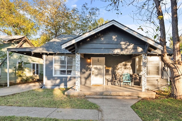 bungalow-style home featuring a porch