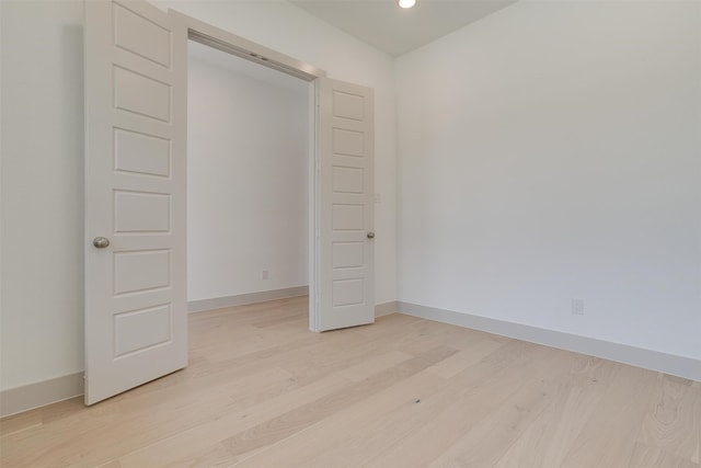 unfurnished bedroom featuring light hardwood / wood-style floors