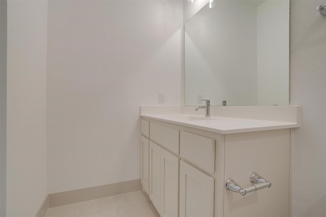 bathroom with vanity and tile patterned flooring