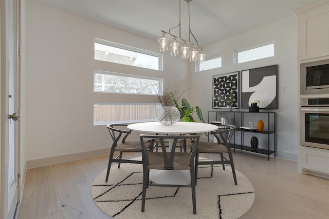 dining room featuring light hardwood / wood-style floors