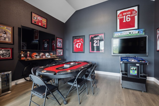 2608 Camden Ct, Celina, TX 75009 - game room featuring wood finished floors, lofted ceiling, baseboards, and wine cooler