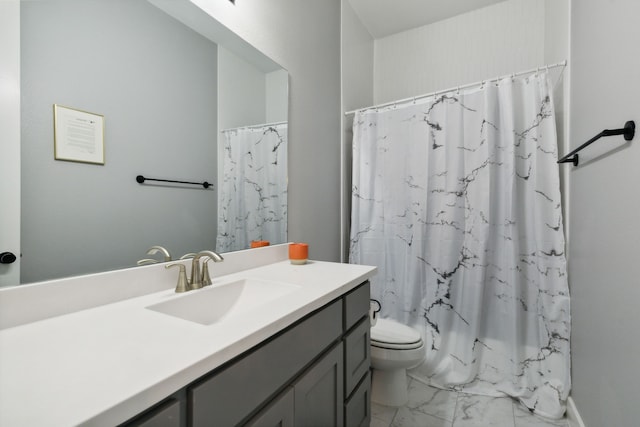 2608 Camden Ct, Celina, TX 75009 - bathroom with marble look tile flooring, vanity, and toilet