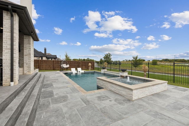 2608 Camden Ct, Celina, TX 75009 - view of swimming pool featuring a patio, a fenced backyard, and a pool with connected hot tub