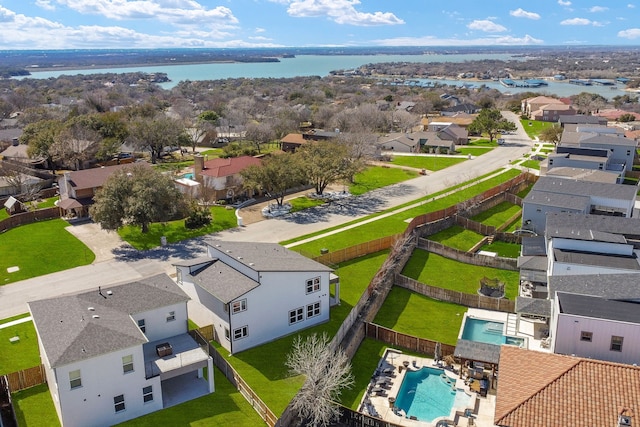 aerial view featuring a water view and a residential view