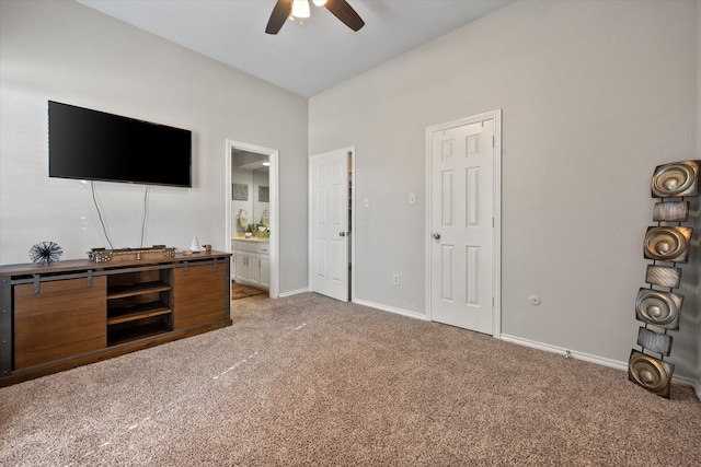 bathroom with a shower, vanity, ceiling fan, and ornamental molding