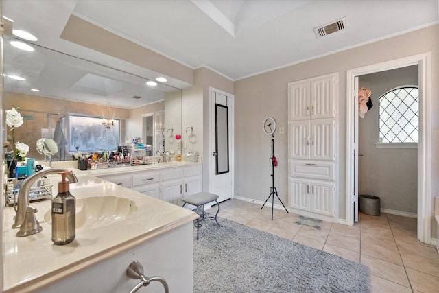 tiled dining area featuring a raised ceiling, ceiling fan, and ornamental molding