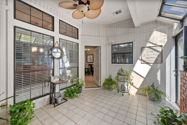 view of patio / terrace featuring french doors and ceiling fan