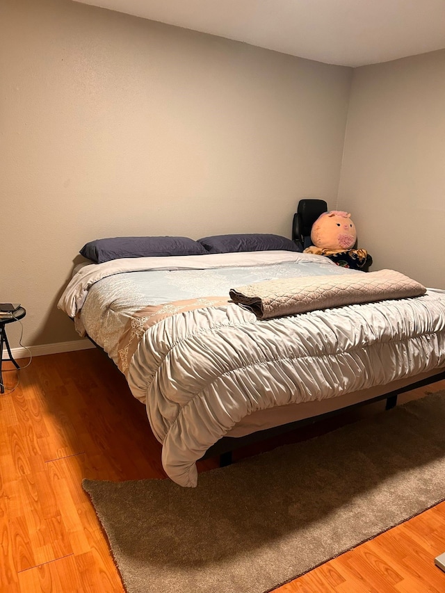 bedroom featuring light hardwood / wood-style floors