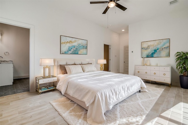 bedroom featuring ceiling fan and light hardwood / wood-style flooring