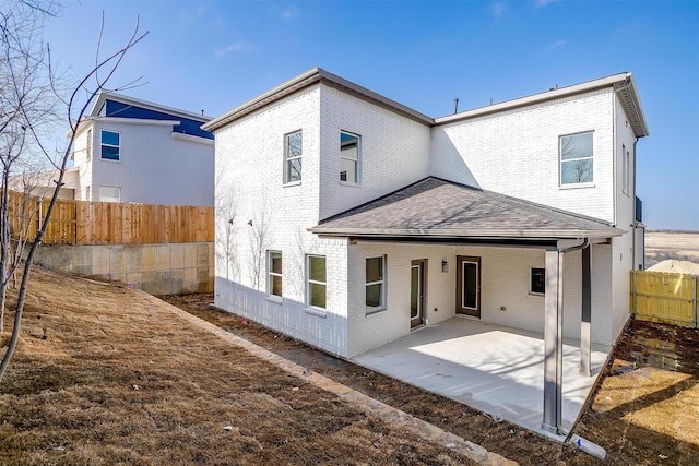 rear view of property with a patio area