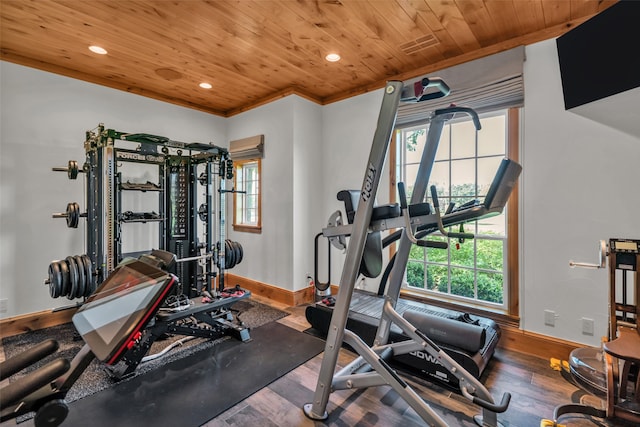 exercise area featuring crown molding, dark wood-type flooring, and wood ceiling