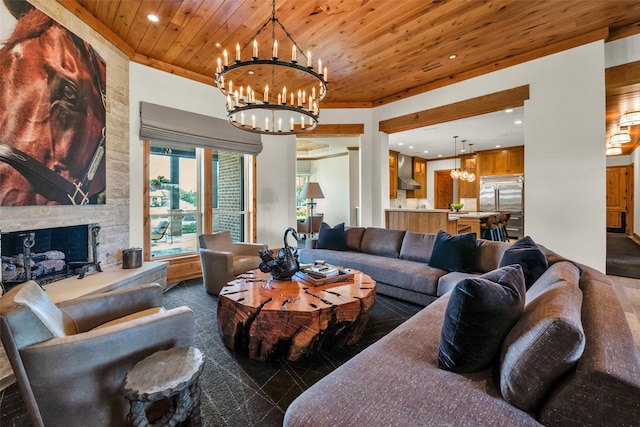 living room featuring a notable chandelier, wooden ceiling, a fireplace, and ornamental molding