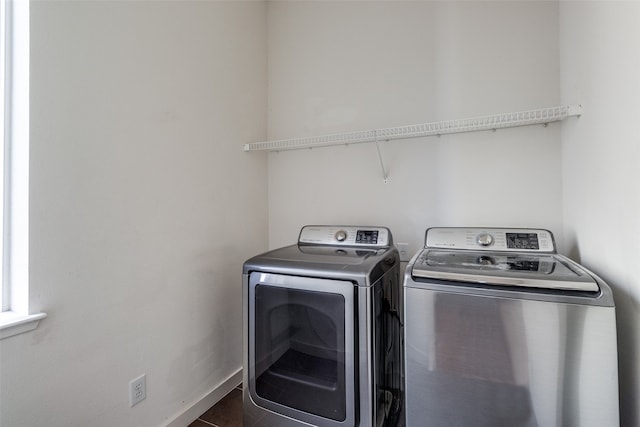 laundry room with washer and dryer