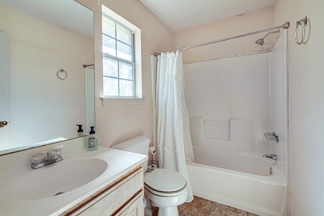 full bathroom with tile patterned flooring, vanity, toilet, and shower / bath combo with shower curtain