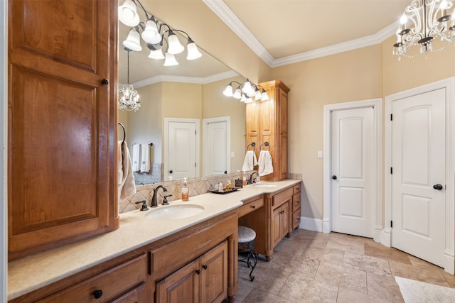 bathroom featuring vanity, a chandelier, and ornamental molding