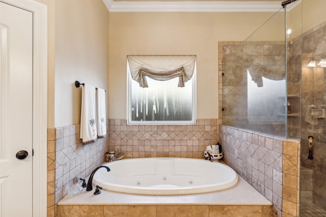 bathroom with separate shower and tub and ornamental molding