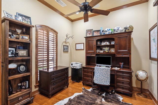 home office with ceiling fan, light wood-type flooring, and crown molding