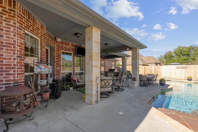 view of patio / terrace featuring a fenced in pool