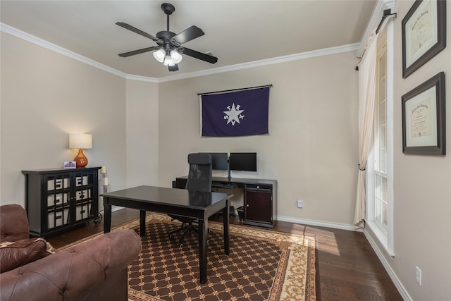 office area with dark wood-type flooring, ornamental molding, and ceiling fan