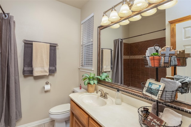 bathroom featuring tile patterned floors, vanity, curtained shower, and toilet