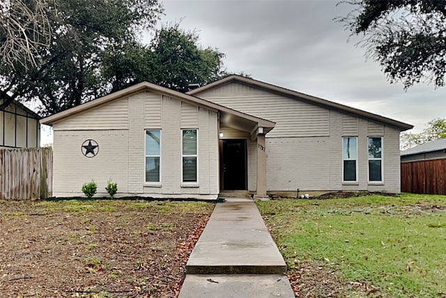 view of front of house with a front yard