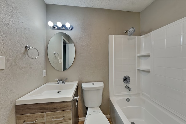 full bathroom with vanity, bathtub / shower combination, a textured ceiling, and toilet