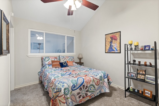 carpeted bedroom with ceiling fan and lofted ceiling